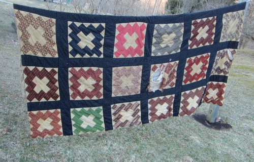 This is one of the three quilts I bought on opening day of our local flea market.  I didn't need any more quilts to restore, but I couldn't resist. They needed me!